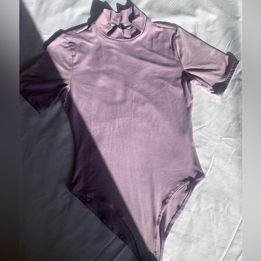Charlotte Russe one piece top
Lavender/purple